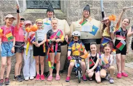  ?? ?? Fancy dress Brownies and Guides won the best-dressed group
Feeling sporty