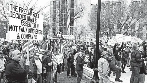  ?? LAUREN JUSTICE/THE NEW YORK TIMES ?? People opposed to Wisconsin Gov. Tony Evers’ stay-at-home order for Wisconsin gathered in Madison on April 24 for protests that were generally decried by public health experts.