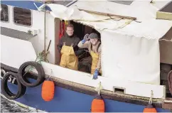  ??  ?? The series “Men in Kilts: A Roadtrip With Sam and Graham” puts Sam Heughan, left, and Graham McTavish on a fishing boat to have a new experience.