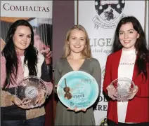  ?? Pic: ?? Rebecca McGrath 2nd, Hayley Richardson, 1st and Caoimhe Flannery, 3rd in the Fiddler of Dooney competitio­n in the Methodist Hall, last Sunday. Carl Brennan.