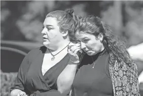  ?? EDUARDO MUNOZ ALVAREZ/AP ?? A woman wipes her tears Sunday after attending the funeral service of Gabby Petito at Moloney’s Funeral Home in Holbrook, N.Y.