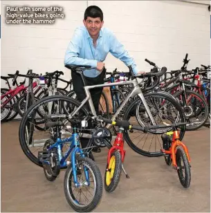  ?? ?? Paul with some of the high-value bikes going under the hammer
