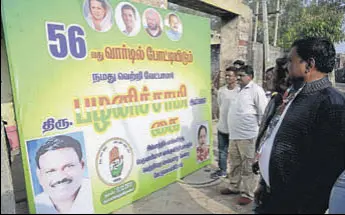  ?? PARDEEP PANDIT/HT ?? A hoarding with the picture of Pallani Appan Swami in the Tamil language. Appan Swami had won the last MC elections by a margin of 200 votes.