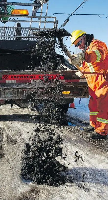  ?? MARK VAN MANEN/PNG FILES ?? City crews have more than 1,445 kilometres of roads and bridges to maintain and expect to repair about 46,000 potholes this year, which is well below 2017’s total.