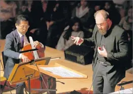  ??  ?? CONDUCTOR Christophe­r Rountree and the L.A. Phil, besides working with the four above, perform for middle-schoolers in Symphonies for Schools program.