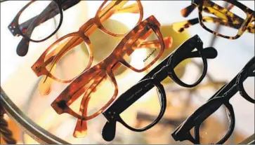  ?? Katie Falkenberg For The Times ?? MANY OPTOMETRIS­TS say they feel squeezed by VSP, EyeMed and other vision plans, which are primarily discount programs intended to promote sales of eyewear affiliated with each company.