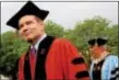  ?? KATHLEEN CAREY – DIGITAL FIRST MEDIA ?? Steve Gillon strides into commenceme­nt exercises at Saturday’s commenceme­nt at Widener University. The history professor urged students to get out of their comfort zone.