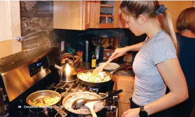  ??  ?? LEFT The author in Sacramento, Calif., preparing a meal for her teammates