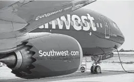  ?? Jae S. Lee / Dallas Morning News / TNS ?? A Boeing 737 Max sits at Southwest Airlines’ headquarte­rs in Dallas in 2017. Southwest has decided to continue its long partnershi­p with Boeing and has ordered 100 737 Max 7 planes aircraft over the next decade.