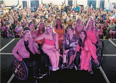  ?? ANDREW FICKE ?? The Rollettes dance team, with founder Chelsie Hill at second from right in front, hosted its annual empowermen­t weekend for women with disabiliti­es in July in Los Angeles.