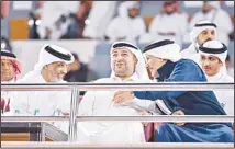  ?? ?? Minister Daoud Marafi, flanked by Abdullah Al-Shaheen and Sheikh Hamad bin Khalifa.