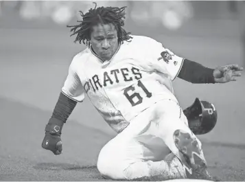  ?? USA TODAY SPORTS ?? “I know what I’m doing is significan­t for my country,” Pirates middle infielder Gift Ngoepe says.