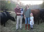  ?? Kevin Myrick / SJ ?? Bennett and Rebecca Jacobs are keeping up this family farm as the fourth generation, and with their children Aubrey, 6, and Nolan, 2, they’ll have a fifth to continue it on as well.