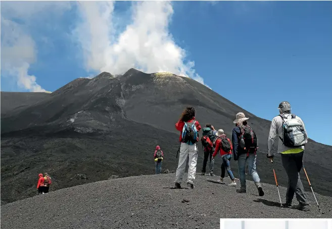  ?? AP ?? Trekking up to the crater of Mt Etna, Sicily? You’d be wise to notify your insurer in advance.