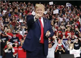  ?? JACQUELYN MARTIN - THE ASSOCIATED PRESS ?? FILE - In this Jan. 9, 2020, file photo, President Donald Trump points as he arrives to speak at a campaign rally, in Toledo, Ohio.
