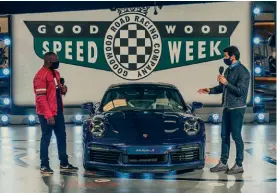  ??  ?? Above Rory Reid and Mark Webber, hosts of ITV4’S live coverage, introduced the new 911 Turbo S to viewers from the studio at Goodwood