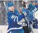  ?? CLAUS ANDERSEN GETTY IMAGES ?? Leafs star Mitchell Marner celebrates his second goal against the Minnesota Wild on Thursday at Scotiabank Arena.