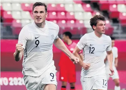  ?? PHOTO: REUTERS ?? One will do . . . Oly Whites striker Chris Wood celebrates scoring his team’s goal in its 10 Tokyo Olympics Group B win over South Korea at Ibaraki Kashima Stadium in Ibaraki, Japan, last night. Callum McCowatt is in the background.