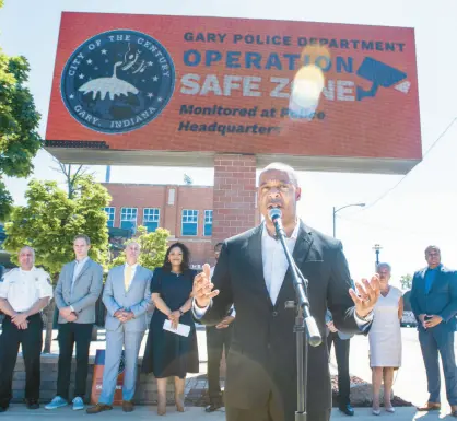  ?? ANDY LAVALLEY/POST-TRIBUNE ?? Mayor Jerome Prince speaks during the rollout ceremony for Operation Safe Zone outside U.S. Steel Yard in Gary on June 16. The citywide public safety initiative is designed to utilize camera feeds and other data from various sources to aid police.