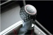  ??  ?? ‘Golf ball’ gearknob and tartan cloth recall early GTIS