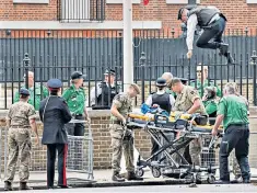  ?? ?? Police and paramedics on Horse Guards Parade yesterday. Three spectators were hurt