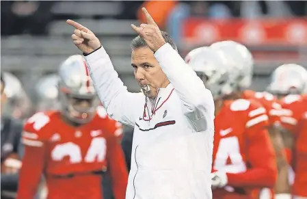  ??  ?? Ohio State coach Urban Meyer has Michigan and Wisconsin up next. GREG BARTRAM/USA TODAY SPORTS