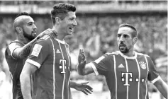  ??  ?? Poland striker Robert Lewandowsk­i led the Bayern romp with a hat-trick.