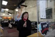  ?? JEFF CHIU-ASSOCIATED PRESS ?? Chef Proprieter Brenda Buenviaje smiles as she is interviewe­d at Brenda’s French Soul Food in San Francisco, Wednesday, Dec. 9.