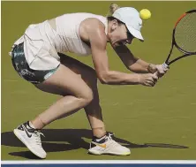  ?? AP PHOTO ?? QUICK EXIT: Top-seeded Simona Halep can’t get a shot back over the net during her stunning first-round loss to Kaia Kanepi yesterday at the U.S. Open in New York.