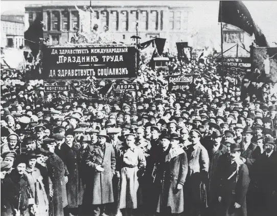  ??  ?? People demonstrat­e in the streets of Moscow in 1917. The Russian Revolution started with demonstrat­ions against the war and the food supply shortages in Petrograd and led to the abdication of Tsar Nicholas II. During the October 1917 Revolution, the...