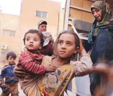  ?? AP ?? Syrian refugees covered in dust arrive at the Trabeel border in 2015. Jordan hopes the ceasefire it helped negotiate will eventually lead to a gradual return home for the refugees.