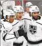  ?? Jim Mone Associated Press ?? GABRIEL VILARDI, center, greets Kings teammates after his goal.