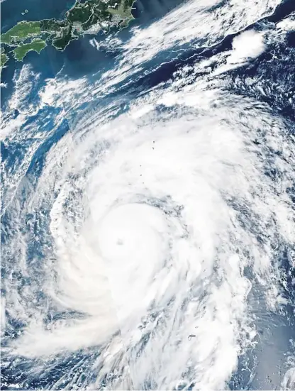  ?? Picture: AP. ?? Scotland’s rugby team are caught in the eye of a storm – Typhoon Hagibis.