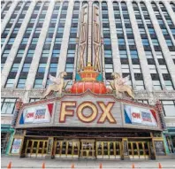  ?? AP PHOTO/PAUL SANCYA ?? The marquee at the Fox Theatre displays signs Monday for the Democratic presidenti­al debates in Detroit. The second scheduled debates, hosted by CNN, will be held Tuesday and Wednesday.