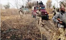  ?? PHOTO: ?? Soldiers in pursuit of Boko Haram members in Borno State Army Headquarte­rs