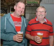  ??  ?? LEFT:
Taking time out during the Millstreet Internatio­nal Horse Show were Patrick Corkery and Joe Roche