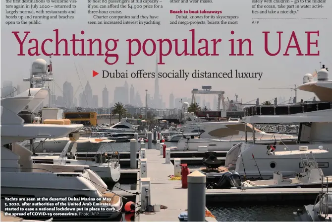  ?? Photo: AFP ?? Yachts are seen at the deserted Dubai Marina on May 5, 2020, after authoritie­s of the United Arab Emirates started to ease a national lockdown put in place to curb the spread of COVID- 19 coronaviru­s.