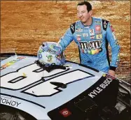  ?? Logan Riely / Getty Images ?? Kyle Busch reacts after winning the NASCAR Cup Series Food City Dirt Race at Bristol Motor Speedway on Sunday.