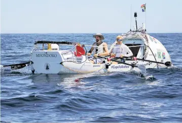  ?? PICTURE: DAVID G RICHARDSON ?? ROW, ROW, ROW: Braam Malherbe and Clyde Barendse set off on a final proving run to Dassen Island where they will spend the night before setting off on the Dot Challenge Cape To Rio row.