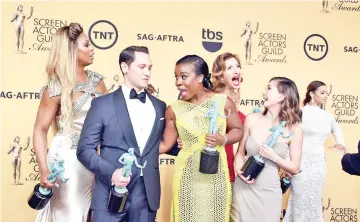  ?? — AFP file photo ?? The cast of ‘Orange is the New Black’ as they pose with the award for Outstandin­g Performanc­e By An Ensemble In A Comedy Series at the 21st Annual Screen Actor’s Guild Awards in Los Angeles, California, on Jan 25, 2015.