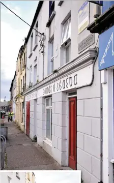  ??  ?? The familiar face of Bridge Street, Dingle, will soon be consigned to history as most of this row of houses is demolished to make way for a new developmen­t. INSET: Work getting underway last Wednesday.