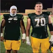  ?? Kody Afusia ?? NATHAN GATES (70) and Makai Sagiao, a transfer from Newport Harbor, have excelled on Edison’s line.