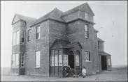  ?? Galt Archives photo 1984100500­2 ?? Riverview House circa 1892 when the Magrath family occupied it. Boulton Magrath is in front of the house.