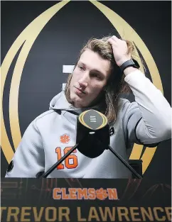  ?? — GETTY IMAGES ?? As a freshman, Clemson Tigers QB Trevor Lawrence threw for 2,933 yards and 27 touchdowns.