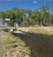  ?? Photos by Fred Rowe ?? Flows in Bishop Creek Canal are low, but high enough to allow fly fishers to fish the canal without spooking the trout.