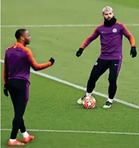  ?? — Reuters ?? Manchester City’s Sergio Aguero and Raheem Sterling during a training session.