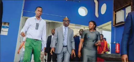  ??  ?? Edo State Governor, Mr. Godwin Obaseki (middle); Senior Special Assistant to the Edo State Governor on Skills Developmen­t and Job Creation, Mrs Ukinebo Dare (right), and Team Lead, Government Science and Technical College Benin Rehabilita­tion Programme, Giles Omezi, during the governor’s inspection tour of the College in Benin City, Edo State capital