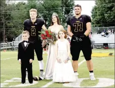  ?? MARK HUMPHREY ENTERPRISE-LEADER ?? Prairie Grove 2019 Homecoming queen Olivia Stroud poses with escorts, senior Graham Guenther (left) and senior Hayden Black, along with attendants, Barrett Watson and Ella Davis. The Tigers won Friday’s Homecoming game by a 48-7 score over Gravette.