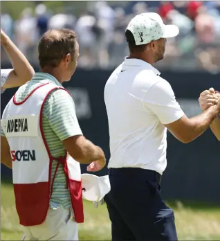  ?? ?? World No.1 Scottie Scheffler with Brooks Koepka, centre