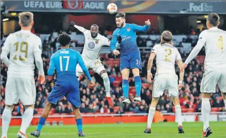  ?? REUTERS ?? Arsenal's Sead Kolasinac (right) duels for the ball with Ostersunds FK's Ronald Mukiibi, at the Emirates Stadium in London on Thursday.